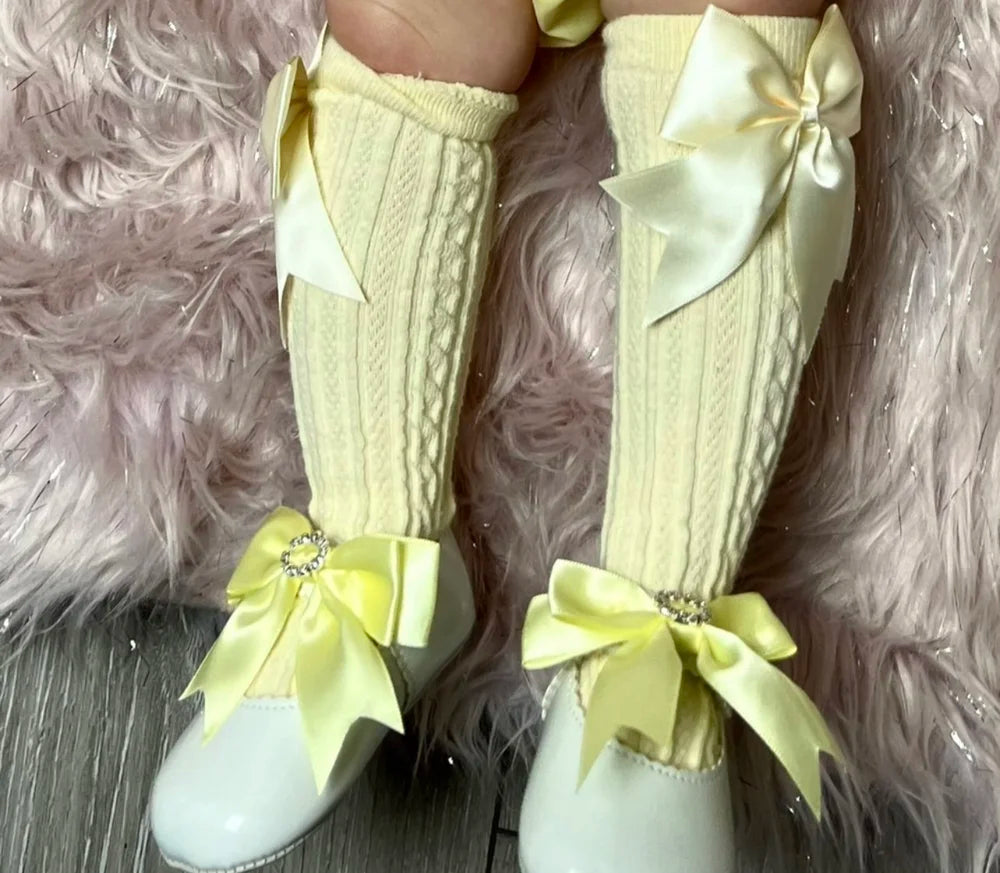 Soft Sole White Shoe With Lemon Diamante Bow