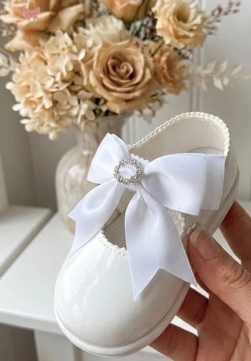 White Hard Sole Shoe With White Diamante Bow