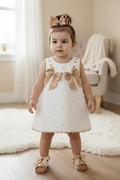 White Waffle Dress With Caramel Bows